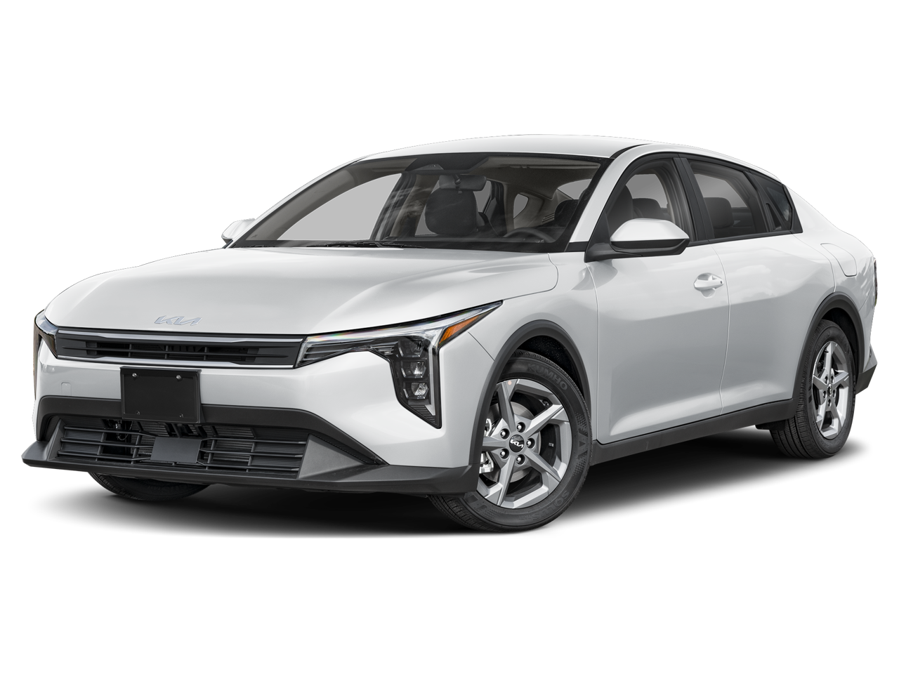 2026 Kia K4 LXS in Snow White Pearl — front three-quarter view